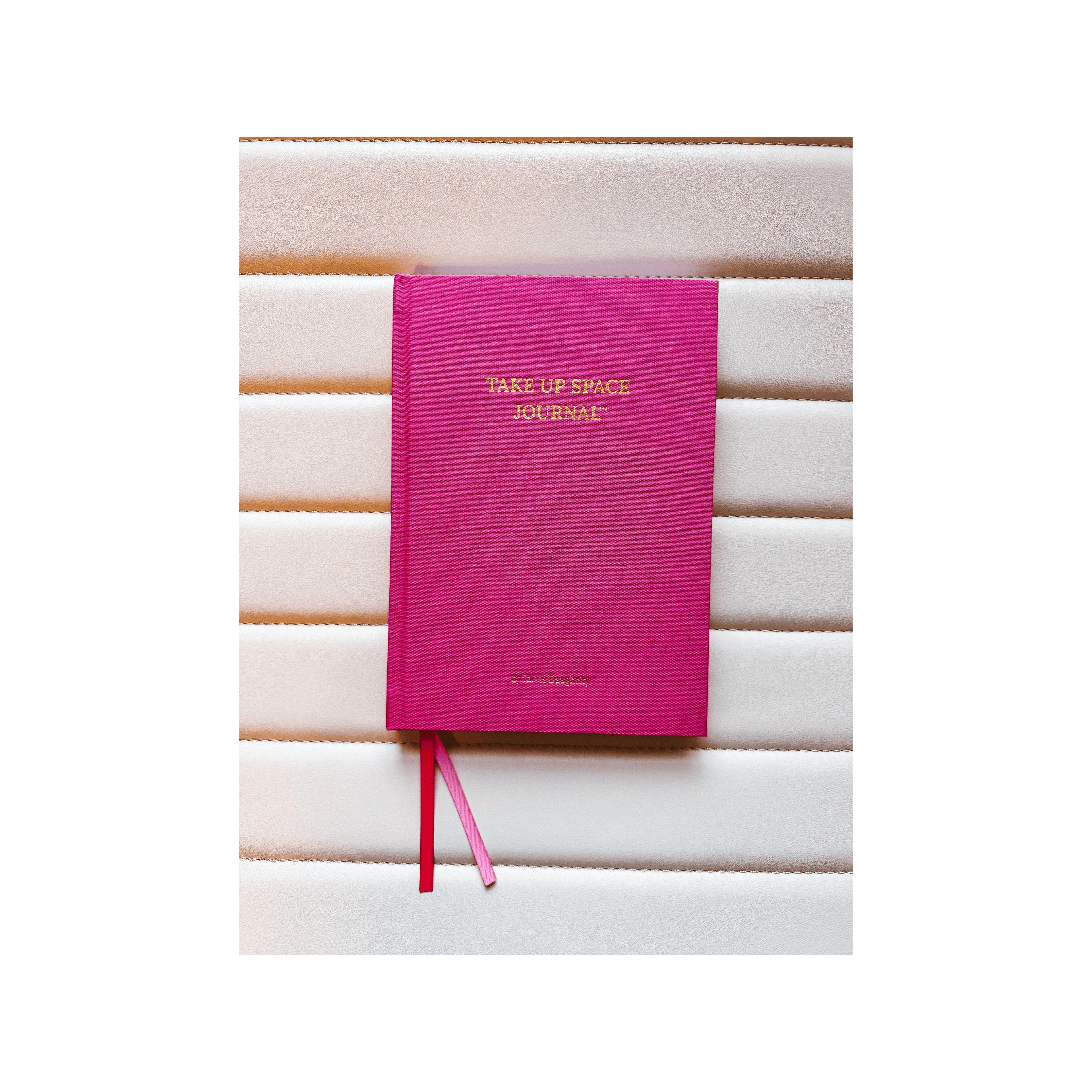 Pink journal titled 'Take Up Space Journal' 